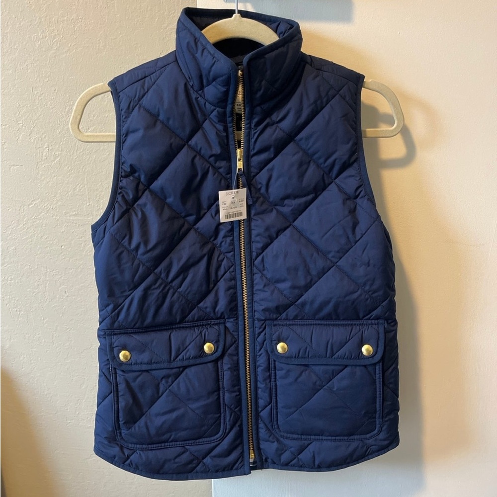 New J. Crew puffer vest with snap pockets